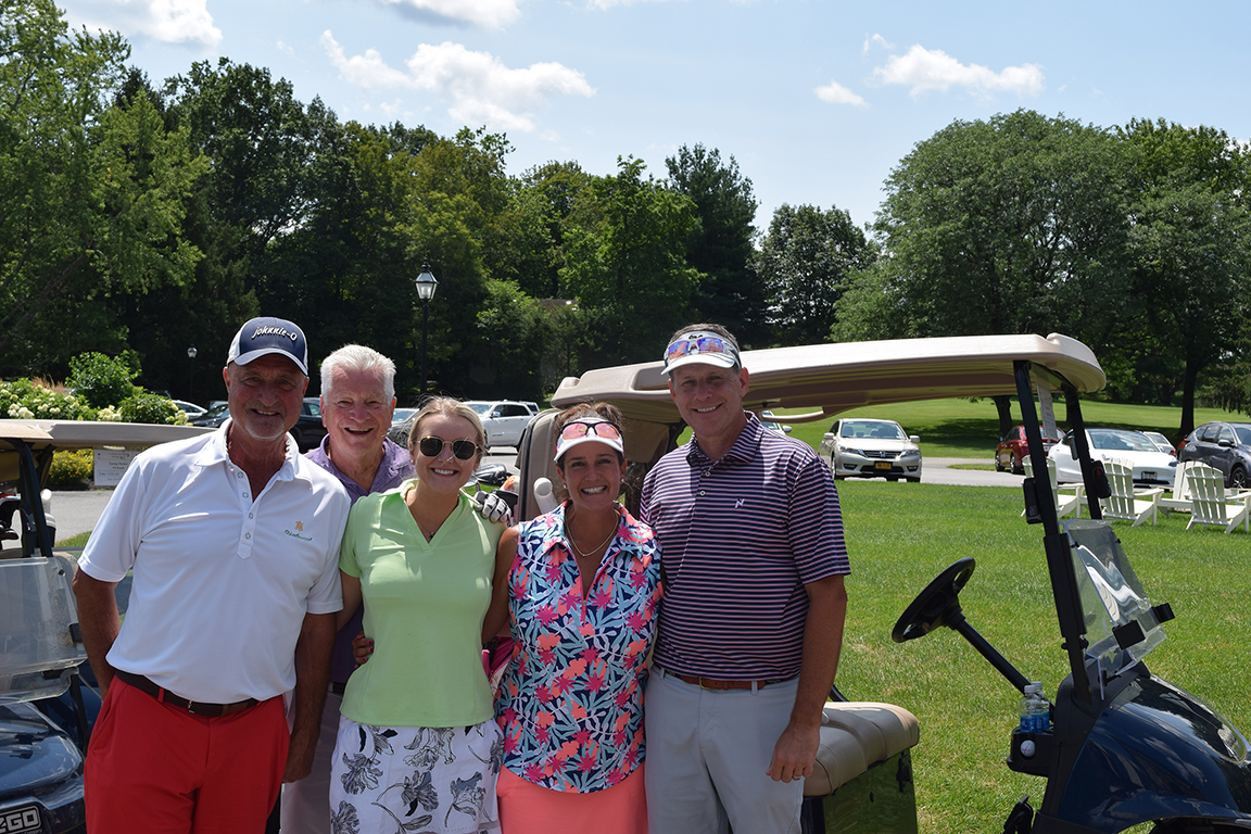 NHR Board Vice President Dan Hickey, President George F. Decker, Jr., Secretary Paige Decker and friends Ann Marie and Ed Kania head back to the course after stopping for lunch at the Club House